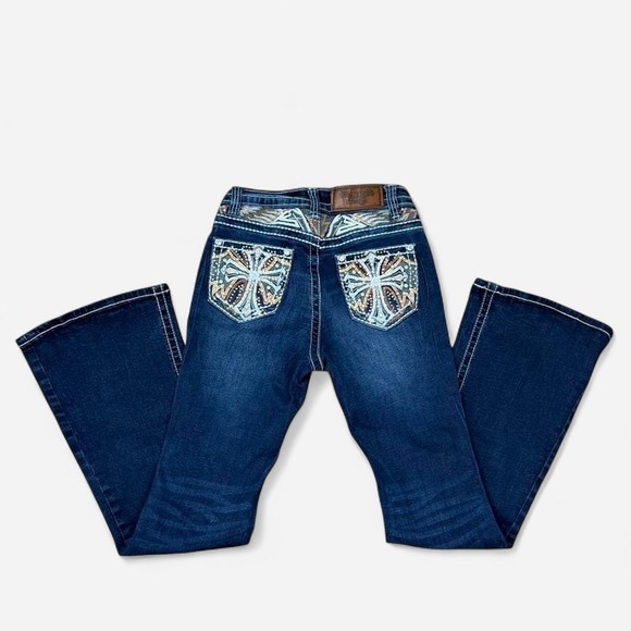 Denim - Westfield Eagle blue denim jeans with cross design on back pockets. Size: 1